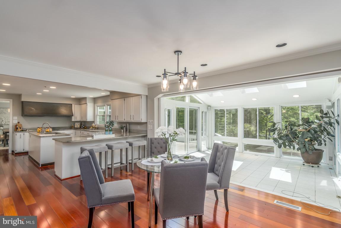 11208 Tara Road Potomac, MD 20854 - Photo 16 of 53 double sun rms allow for lovely light-filled rooms
