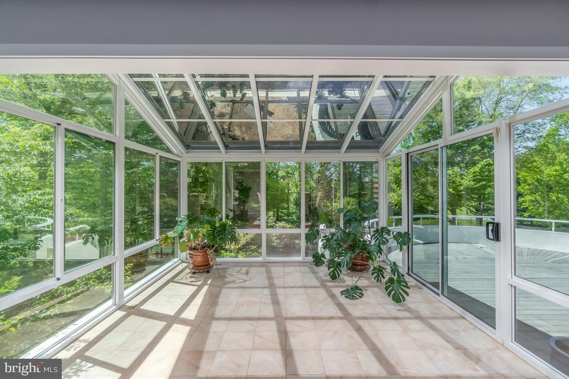 11208 Tara Road Potomac, MD 20854 - Photo 23 of 53 sunroom has special tinted coating to keep cooler