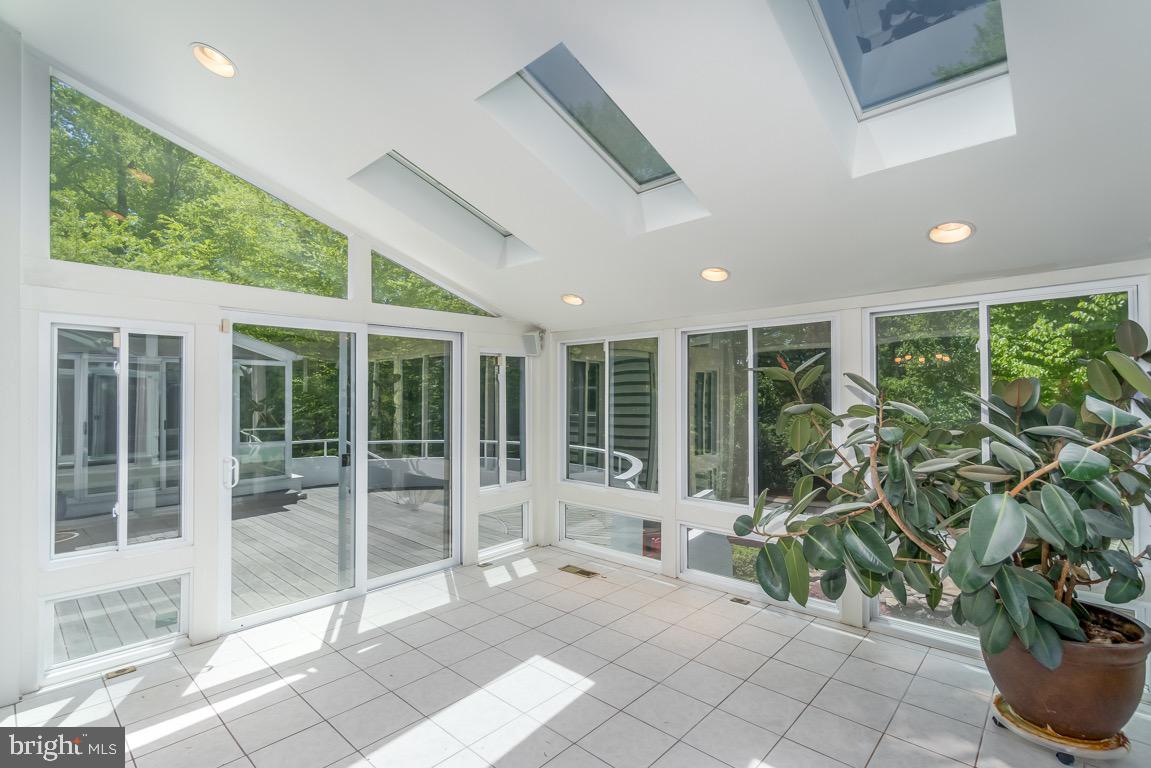 11208 Tara Road Potomac, MD 20854 - Photo 27 of 53 sunrooms lead out to a large deck