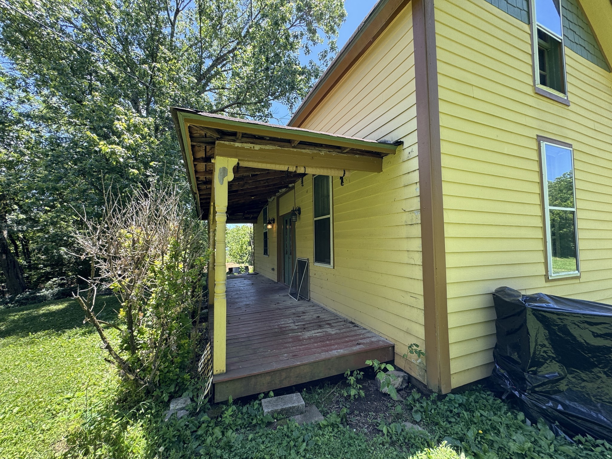2342 Valley Creek Road Culleoka, TN 38451 - Photo 2 of 24 a front view of a house with garden