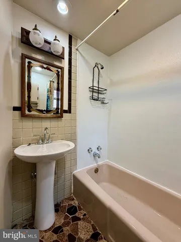 a bathroom with a sink and a toilet