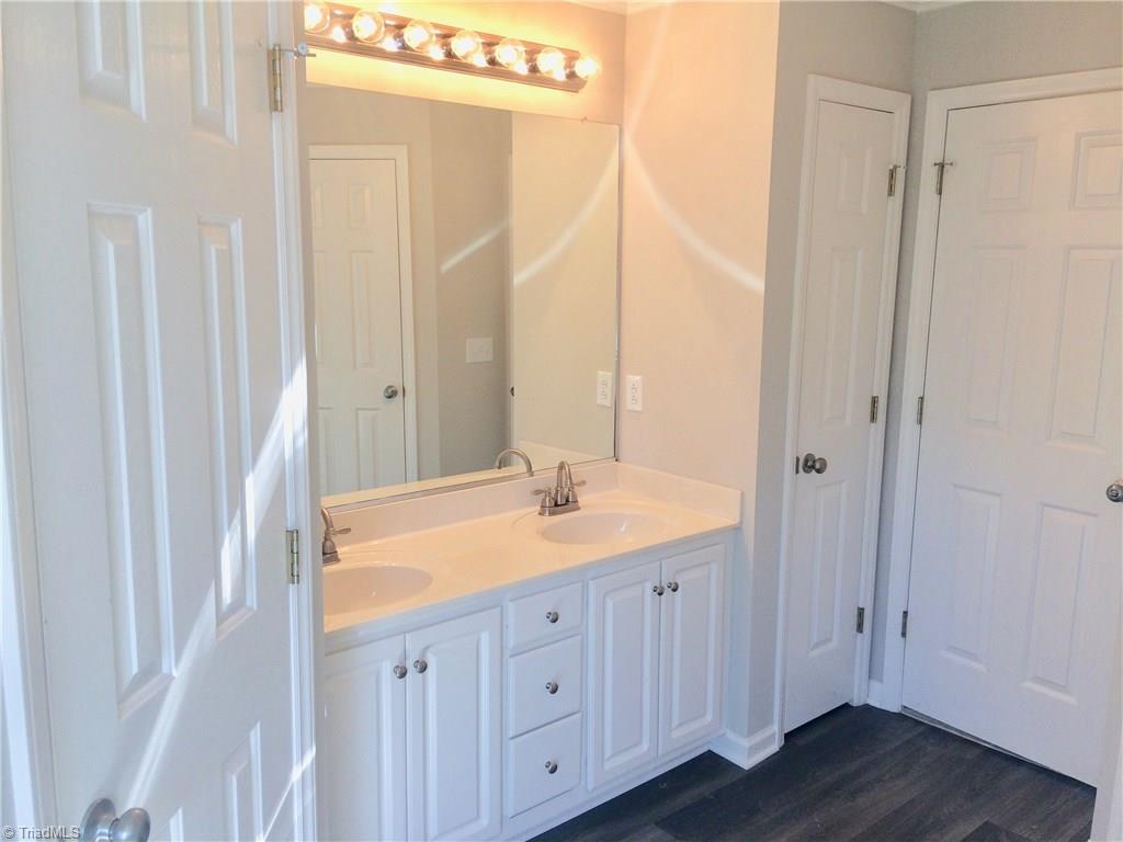 5935 Old Plank Road High Point, NC 27265 - Photo 14 of 17 Oversized vanity with dual sinks and linen closet.