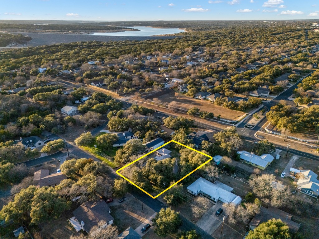224 Clear Springs Road Georgetown, TX 78628 - Photo 8 of 32 Aerial perspective of suburban area with property boundaries highlighted and a nearby body of water