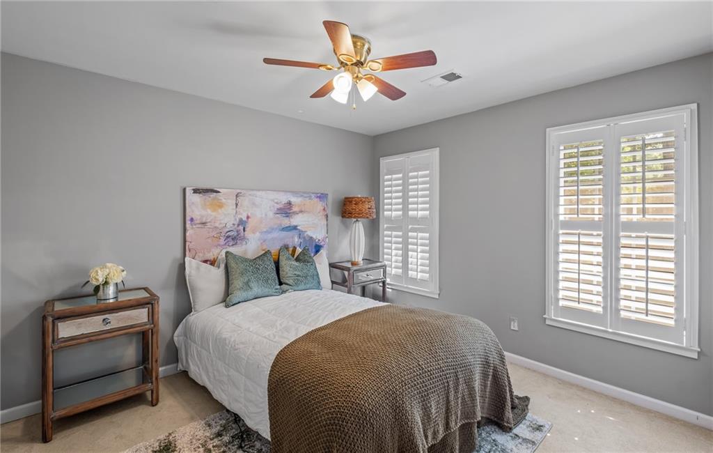 555 Douthit Ferry Road Cartersville, GA 30120 - Photo 24 of 36 a bedroom with a bed and a window