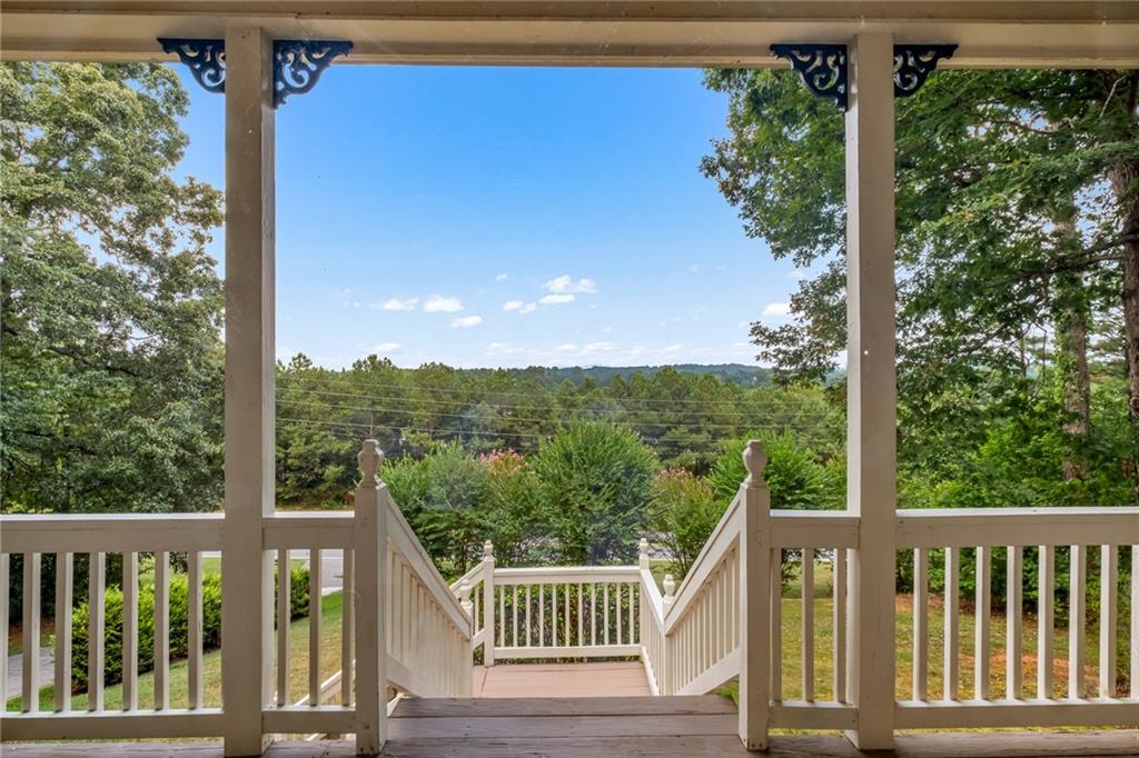 555 Douthit Ferry Road Cartersville, GA 30120 - Photo 3 of 36 a view of a balcony with an outdoor space