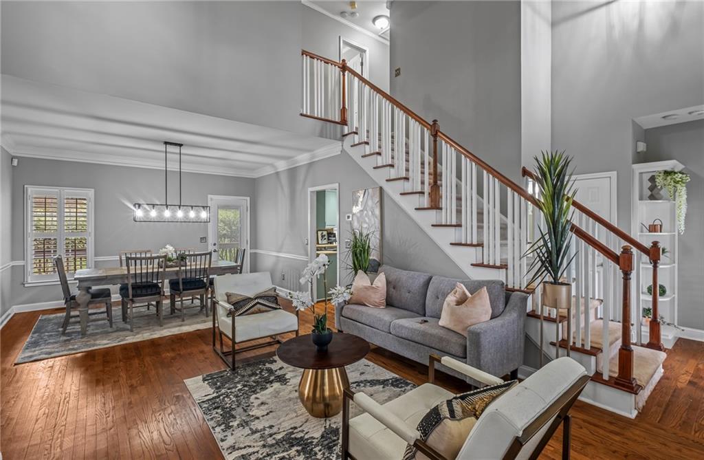 555 Douthit Ferry Road Cartersville, GA 30120 - Photo 9 of 36 a living room with furniture and a chandelier