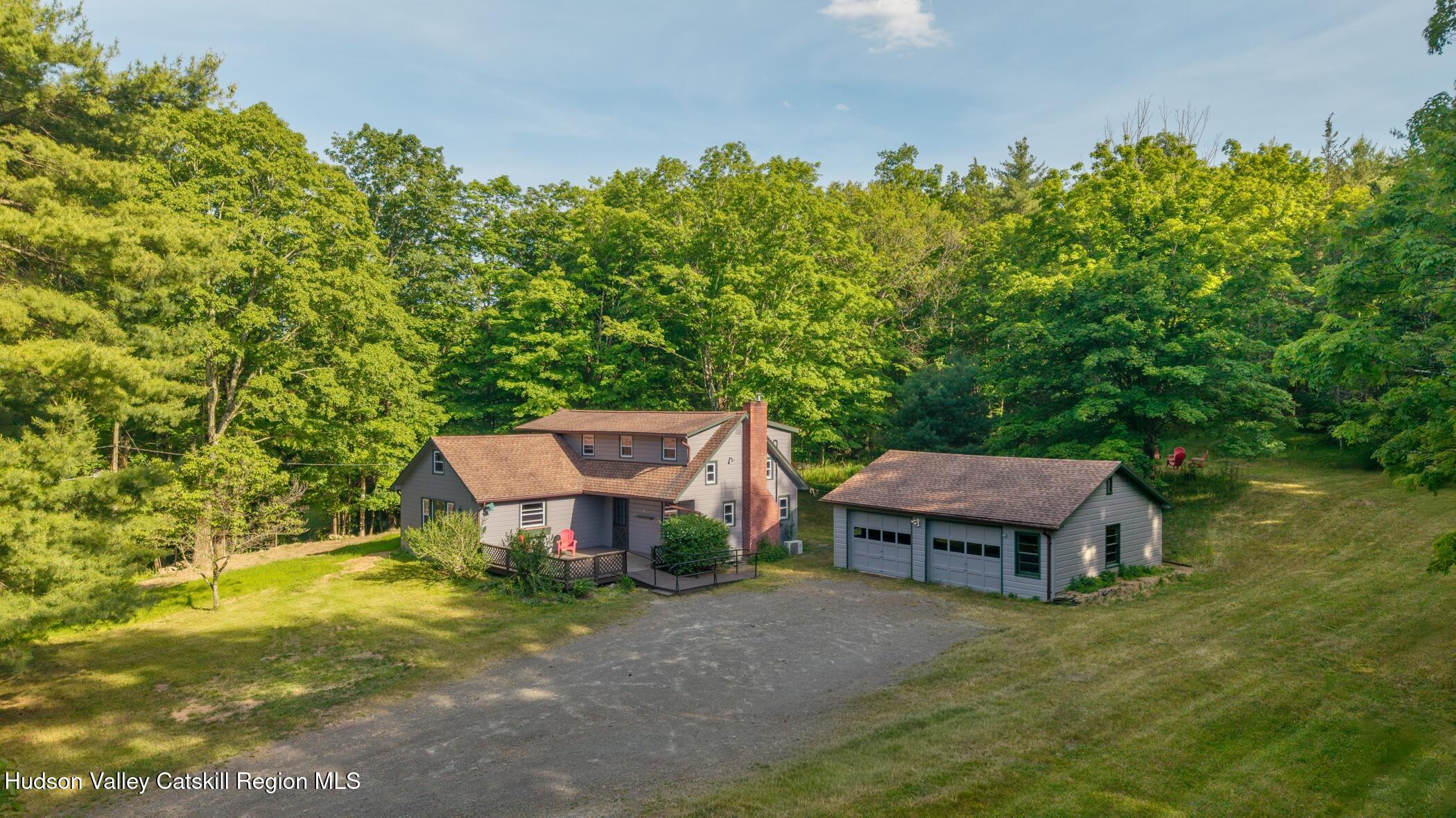 4533 Atwood Road Stone Ridge, NY 12484 - Photo 2 of 63 a view of a house with a yard plants and large tree