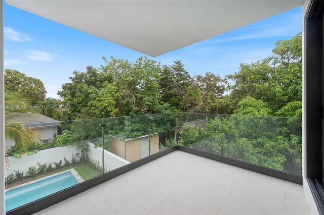 a view of a balcony with an outdoor space