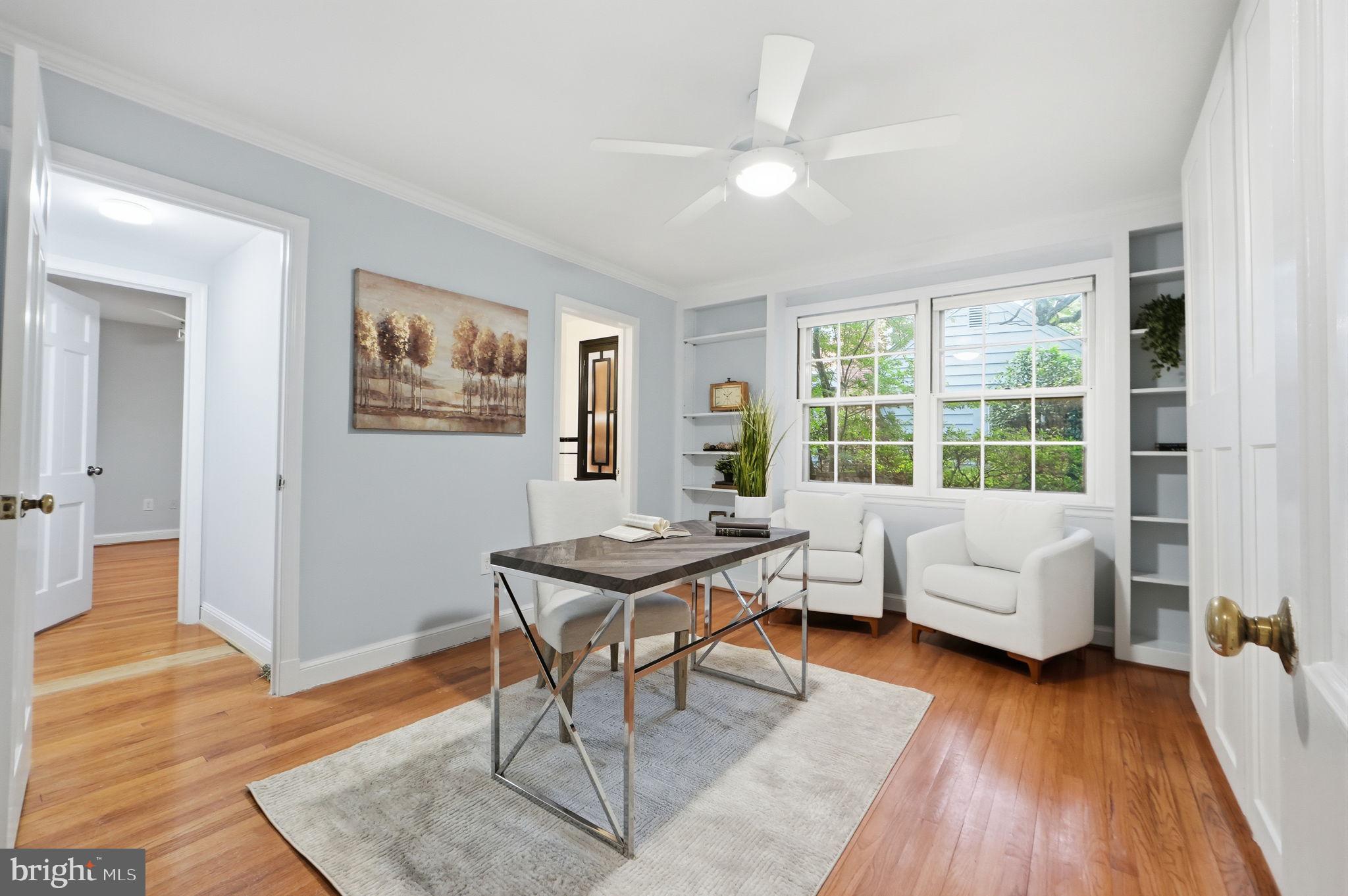 5910 Overlea Road Bethesda, MD 20816 - Photo 23 of 56 a living room with furniture and a large window