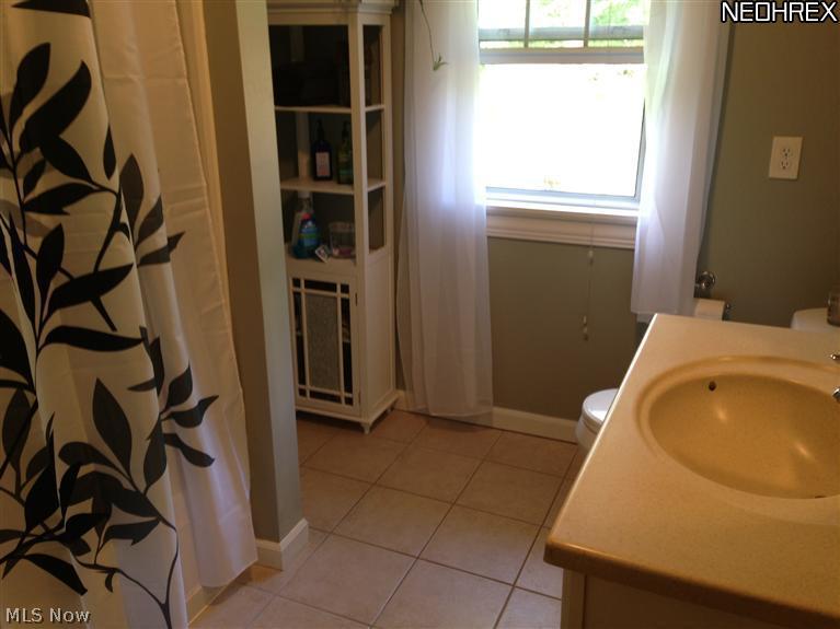 4073 Foskett Road Medina, OH 44256 - Photo 12 of 23 Bath room with ceramic title on first floor.
