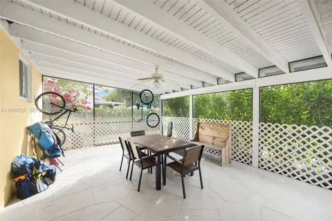 a view of a dining room with furniture outdoor view and balcony