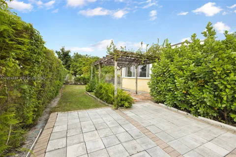 a view of a pathway both side of building