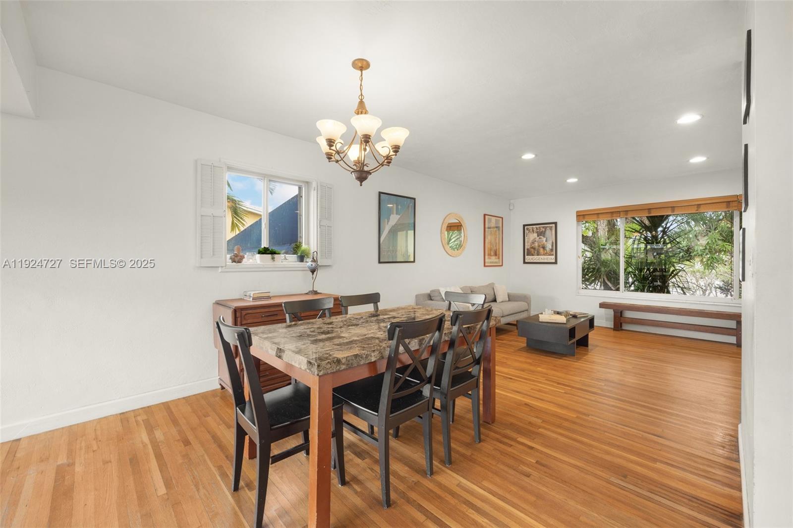 1420 Southwest 82nd Avenue Miami, FL 33144 - Photo 7 of 25 a view of a dining room with furniture window and wooden floor