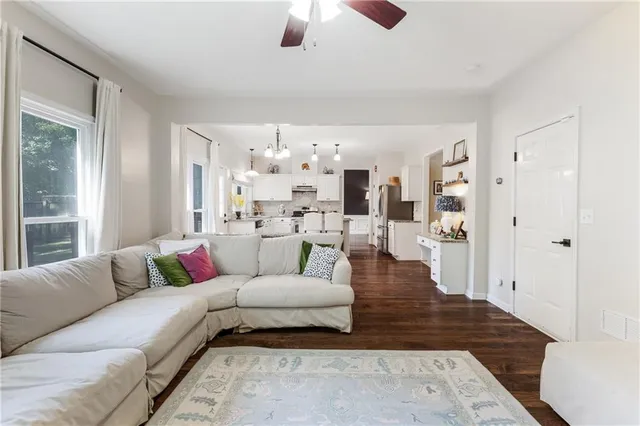 a living room with furniture and a couch