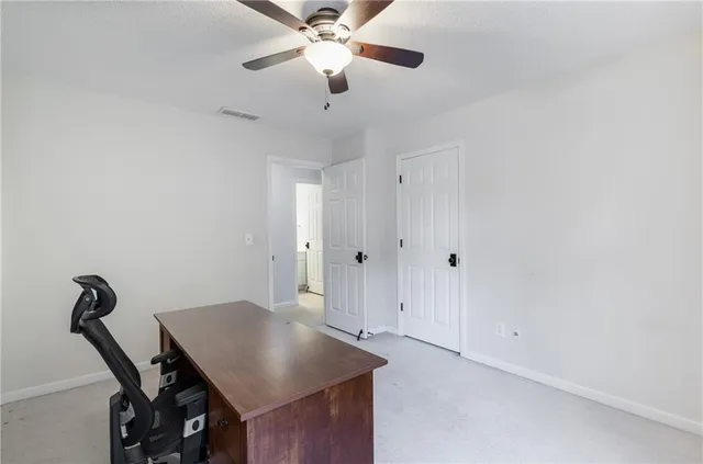 a view of a backyard with wooden floor