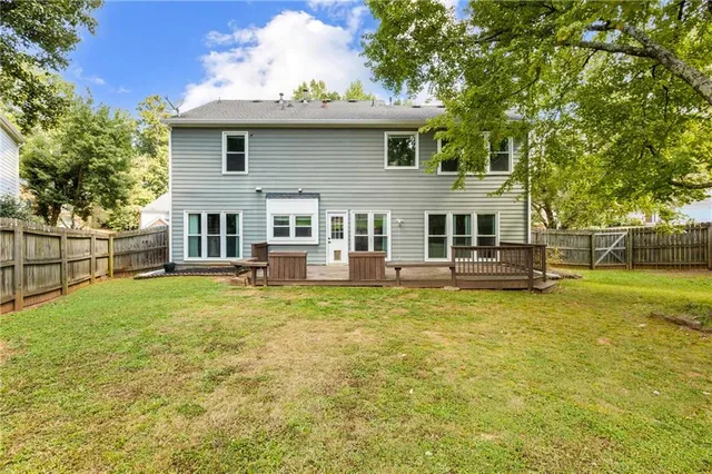 a picture of a bathroom with a shower