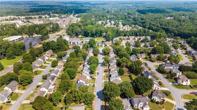 a view of a swimming pool with a yard
