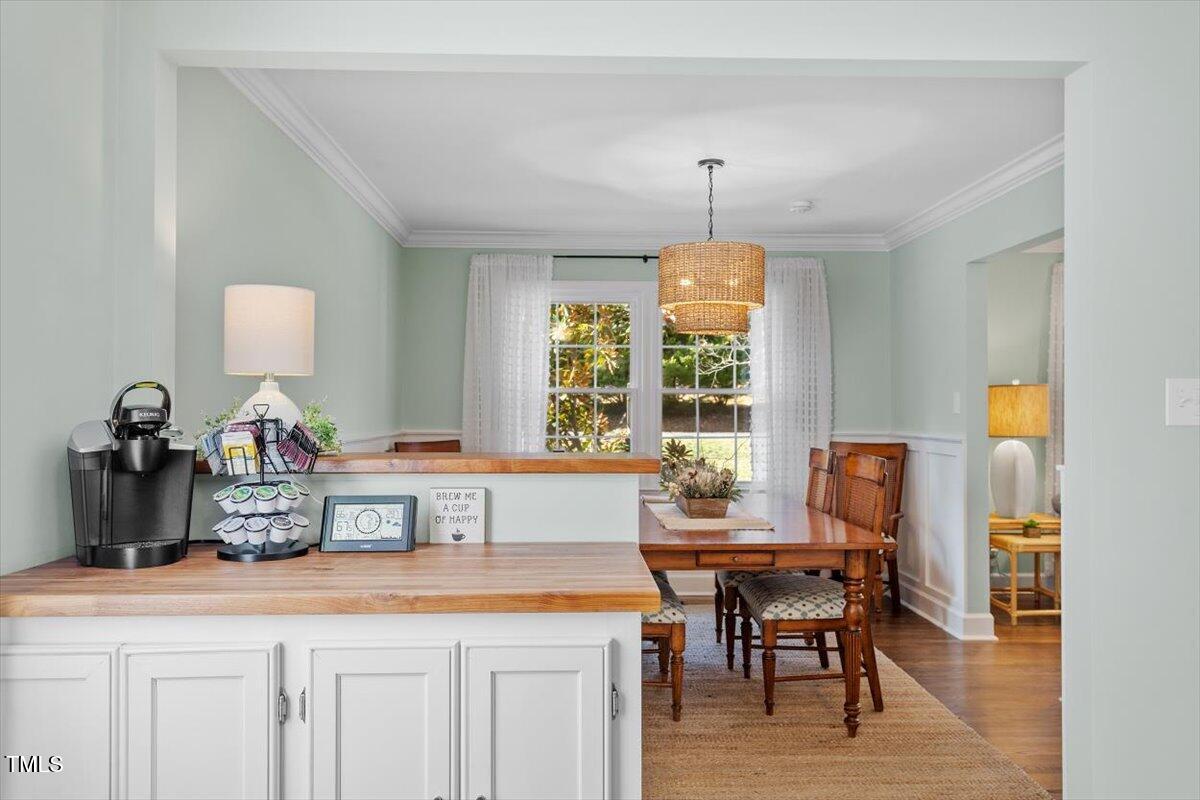 134 Landsbury Drive Durham, NC 27707 - Photo 15 of 44 a dining room with furniture and window