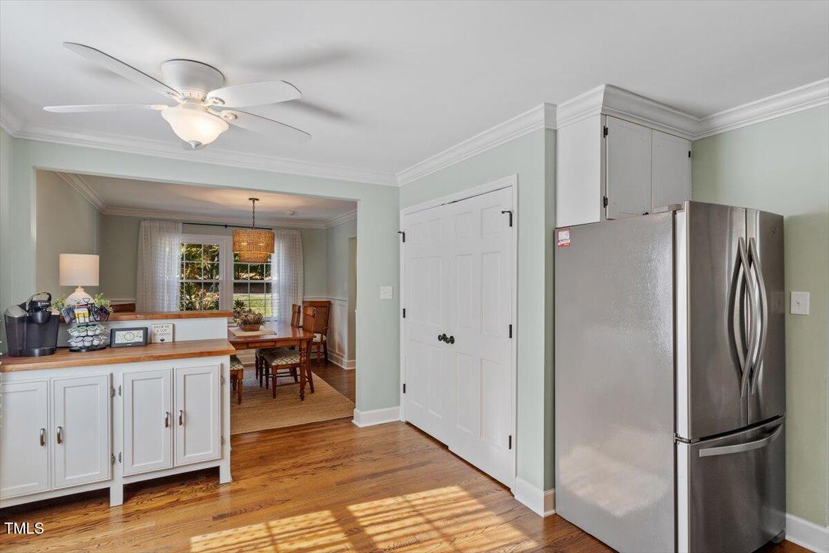 134 Landsbury Drive Durham, NC 27707 - Photo 17 of 44 a kitchen with stainless steel appliances a refrigerator and a stove top oven