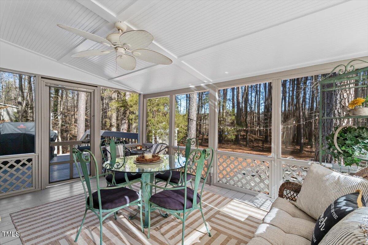 134 Landsbury Drive Durham, NC 27707 - Photo 37 of 44 a living room with furniture and a flat screen tv
