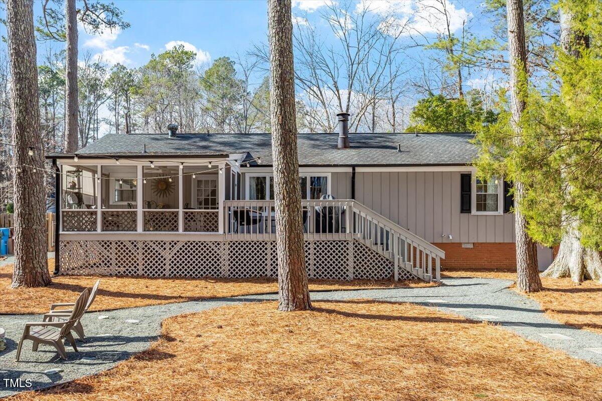 134 Landsbury Drive Durham, NC 27707 - Photo 40 of 44 a front view of a house with a garden