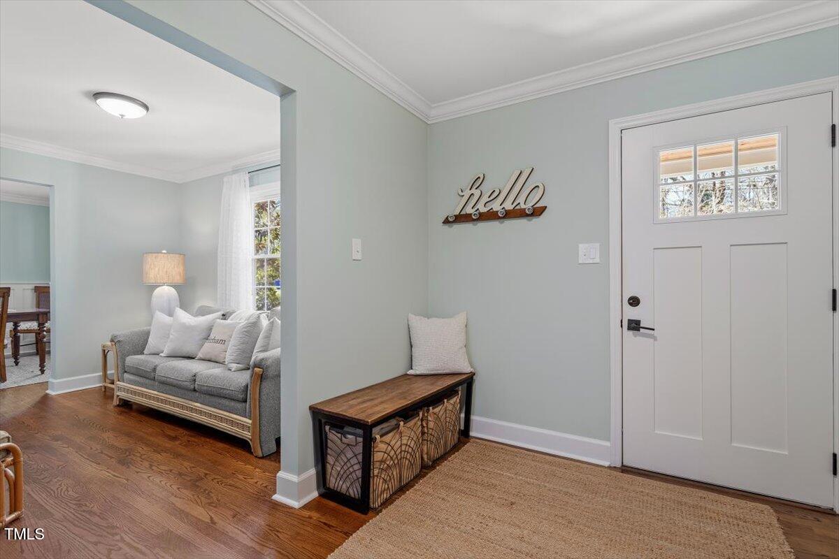 134 Landsbury Drive Durham, NC 27707 - Photo 7 of 44 a living room with furniture and a window