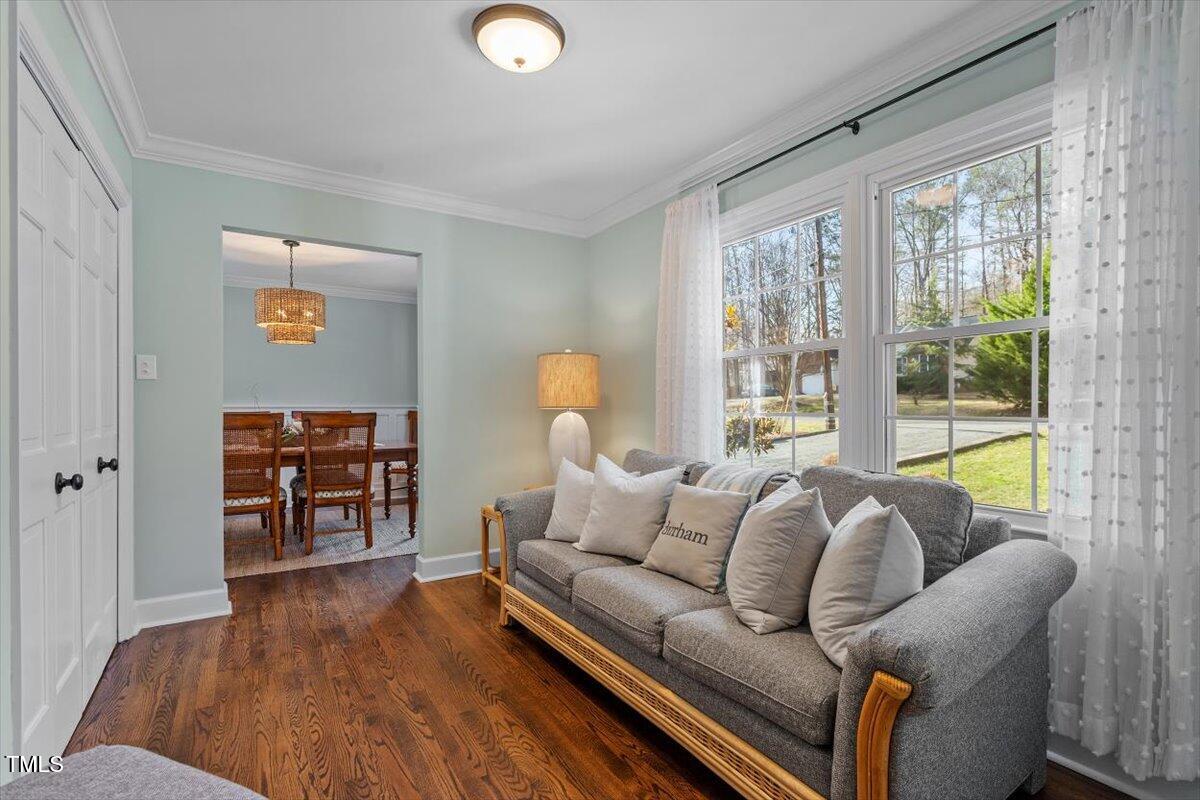 134 Landsbury Drive Durham, NC 27707 - Photo 9 of 44 a living room with furniture and wooden floor
