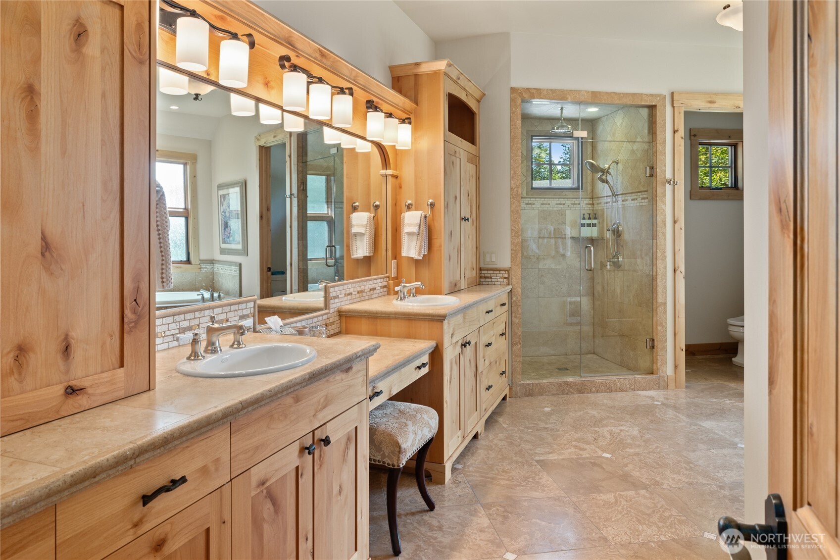 1531 Larkspur Loop Cle Elum, WA 98922 - Photo 17 of 36 a spacious bathroom with a shower sink and mirror