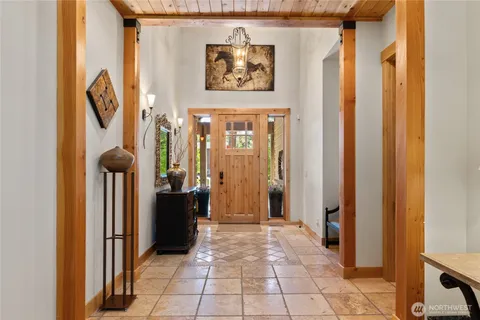 a view of a entryway door front of a house