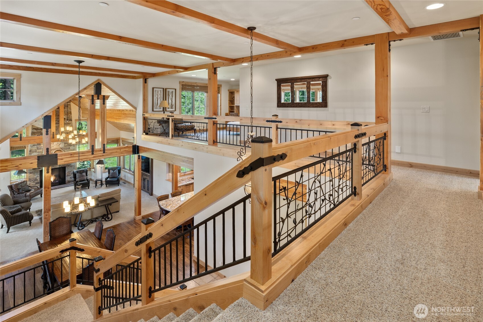 1531 Larkspur Loop Cle Elum, WA 98922 - Photo 21 of 36 a view of staircase with lots of frames on wall and a window