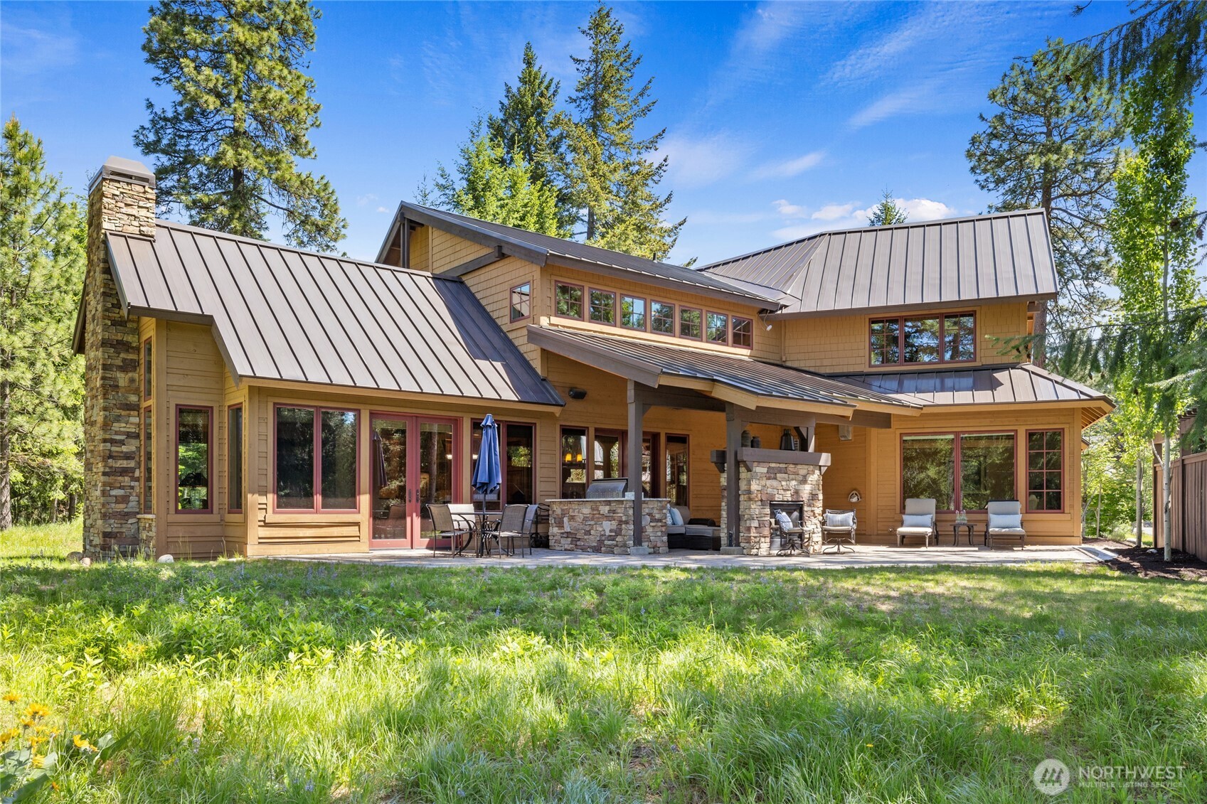 1531 Larkspur Loop Cle Elum, WA 98922 - Photo 30 of 36 a view of a house with a yard patio and fire pit