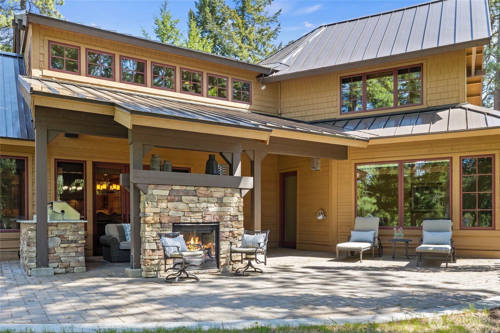 1531 Larkspur Loop Cle Elum, WA 98922 - Photo 31 of 36 a view of a building with a patio outdoor seating area
