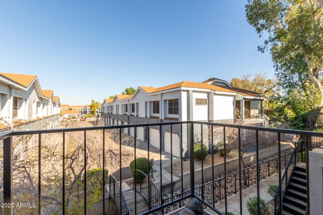 a view of a building from a balcony