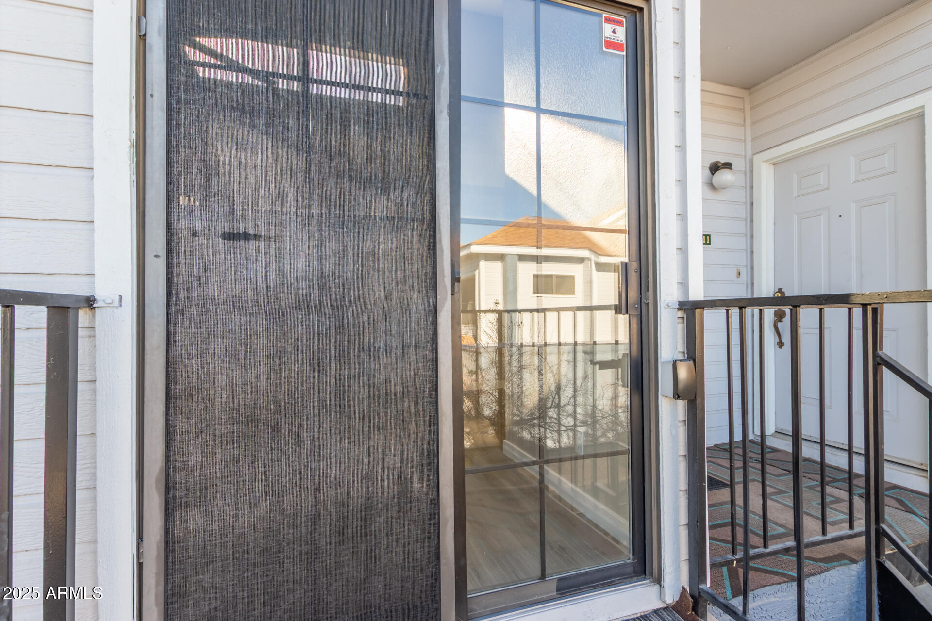 8888 North 47th Avenue, Unit 212 Glendale, AZ 85302 - Photo 16 of 18 a bathroom with a glass shower door
