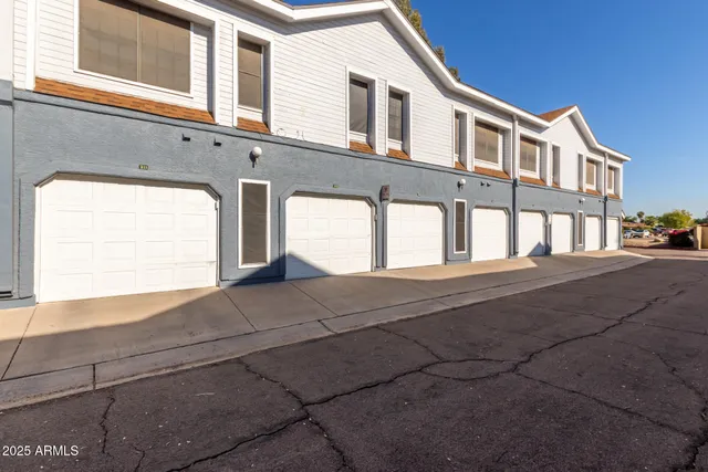 a front view of a house with a garage
