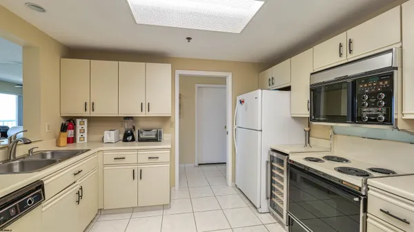 a bathroom with a double vanity sink mirror and double