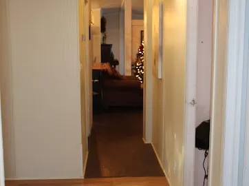 a view of a bedroom from a hallway