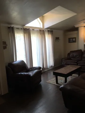 a room with furniture and window