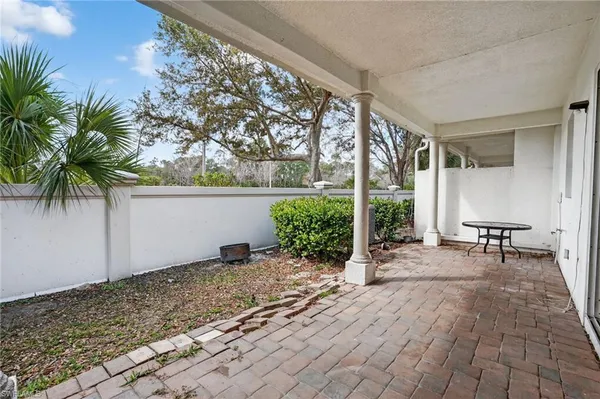 a view of outdoor space with porch and furniture