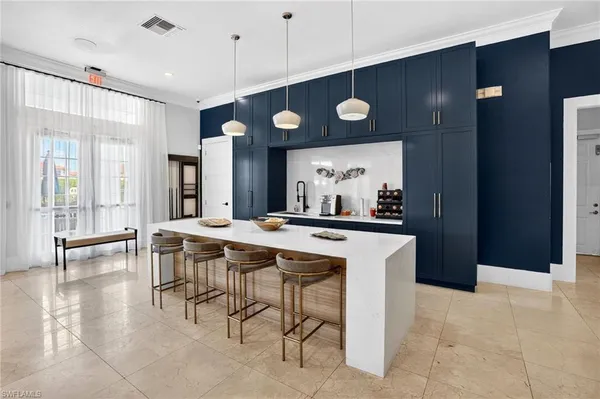 a view of a table and chairs in a kitchen