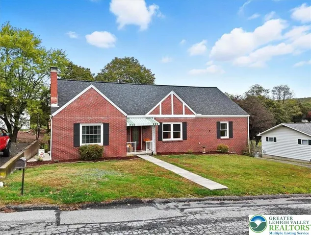 front view of house with a yard