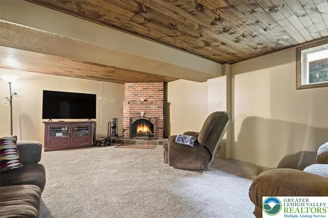 a bathroom with a sink mirror and toilet