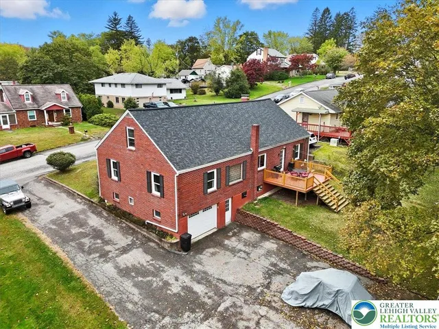 a view of a patio with a table and chairs