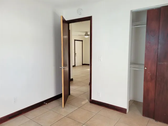 a view of a room that has a door in it