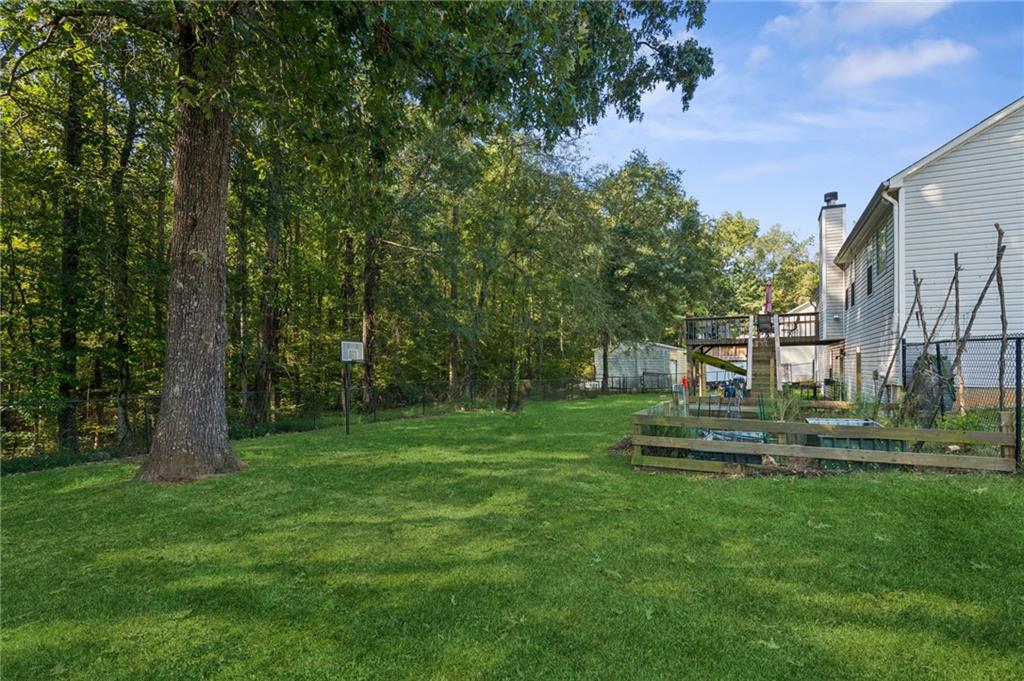 115 Alcovy Circle Covington, GA 30014 - Photo 25 of 27 a view of a park with large trees