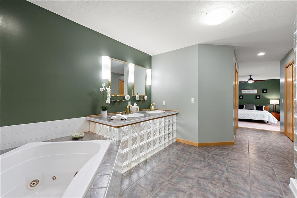 49 Babcock Road Mercer, PA 16137 - Photo 34 of 49 a bathroom with a tub sink and mirror