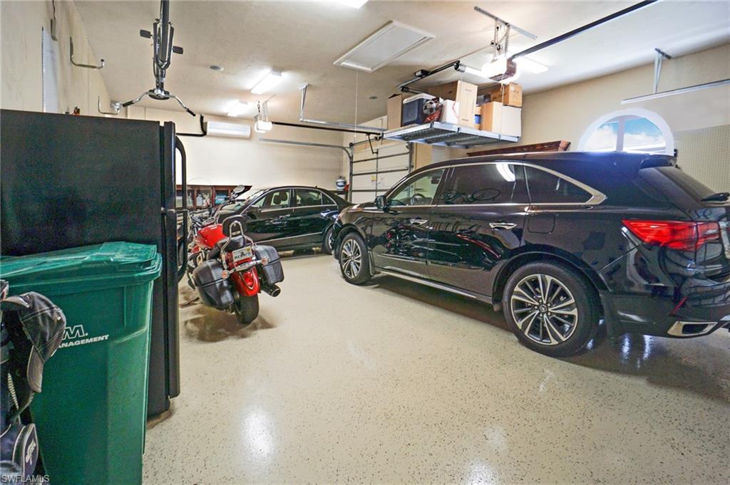 7316 Hagen Way Naples, FL 34113 - Photo 42 of 48 a view of car garage