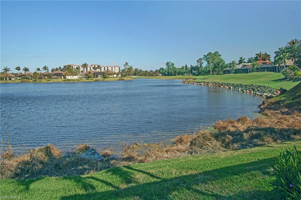 7316 Hagen Way Naples, FL 34113 - Photo 45 of 48 a view of a lake with a big yard