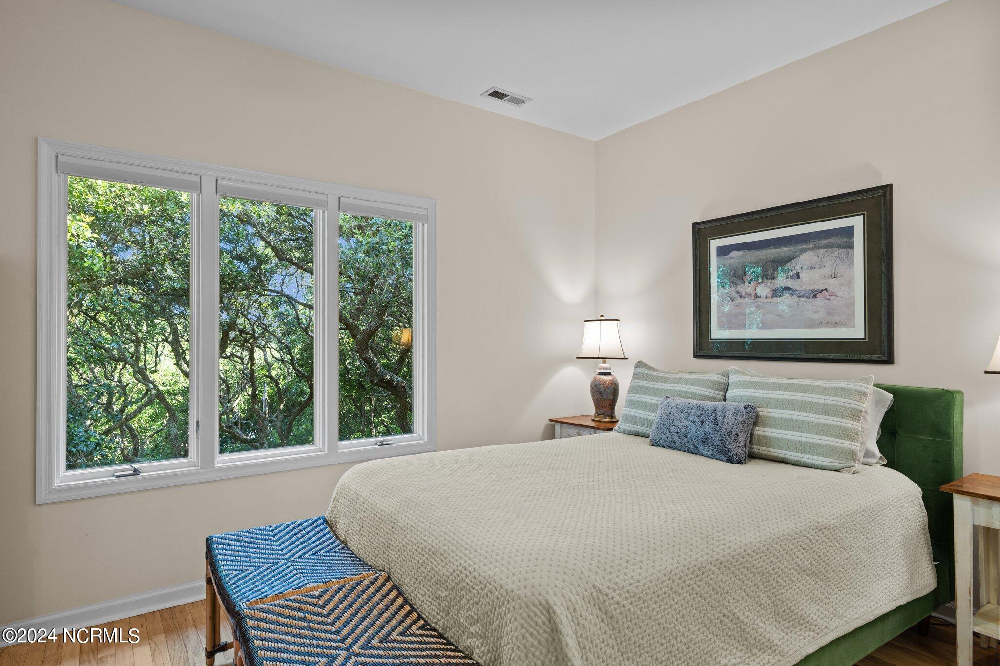 549 Coral Ridge Road Pine Knoll Shores, NC 28512 - Photo 12 of 80 Primary bedroom