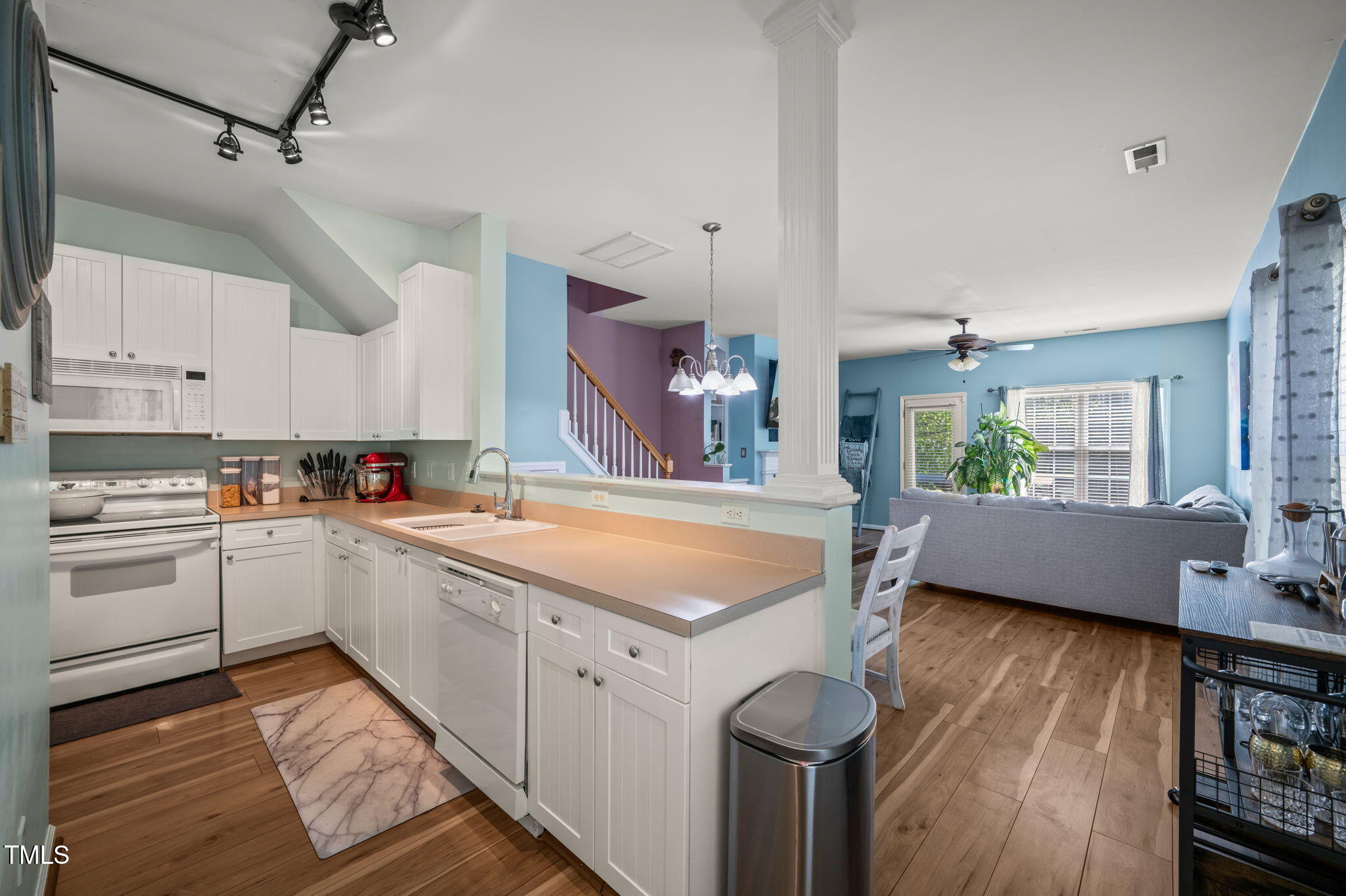 2105 Metacomet Way Raleigh, NC 27604 - Photo 8 of 43 a kitchen with cabinets a sink and appliances